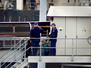 Protesters lock on to conveyer belt at Midways